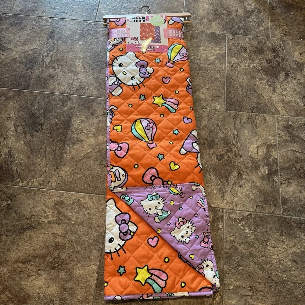 NWT Hello Kitty Frolicking Fun Orange Quilt Quilted TWIN Blanket On Hanger 60x90